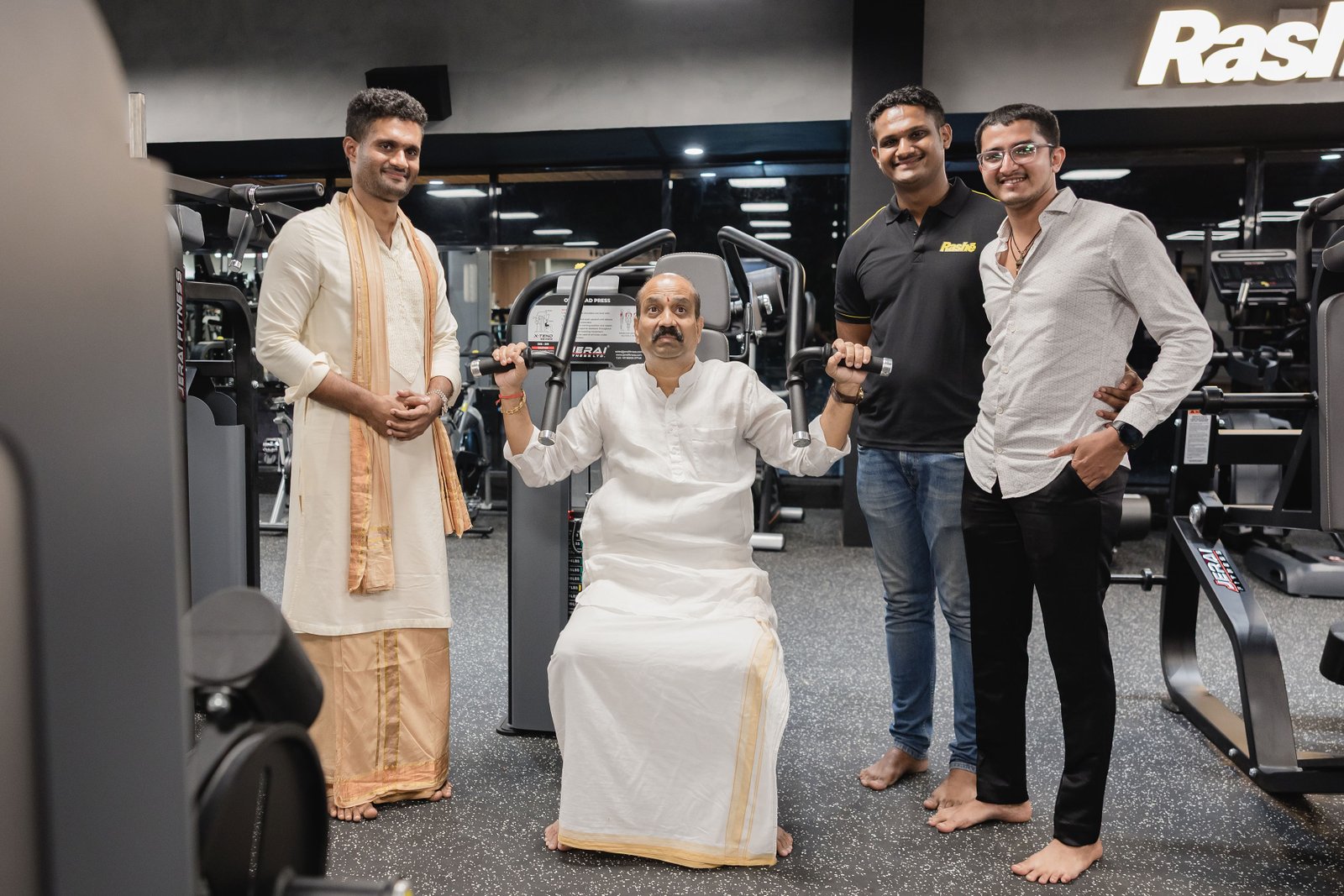 Guest trying gym equipment at Rashé Fitness launch